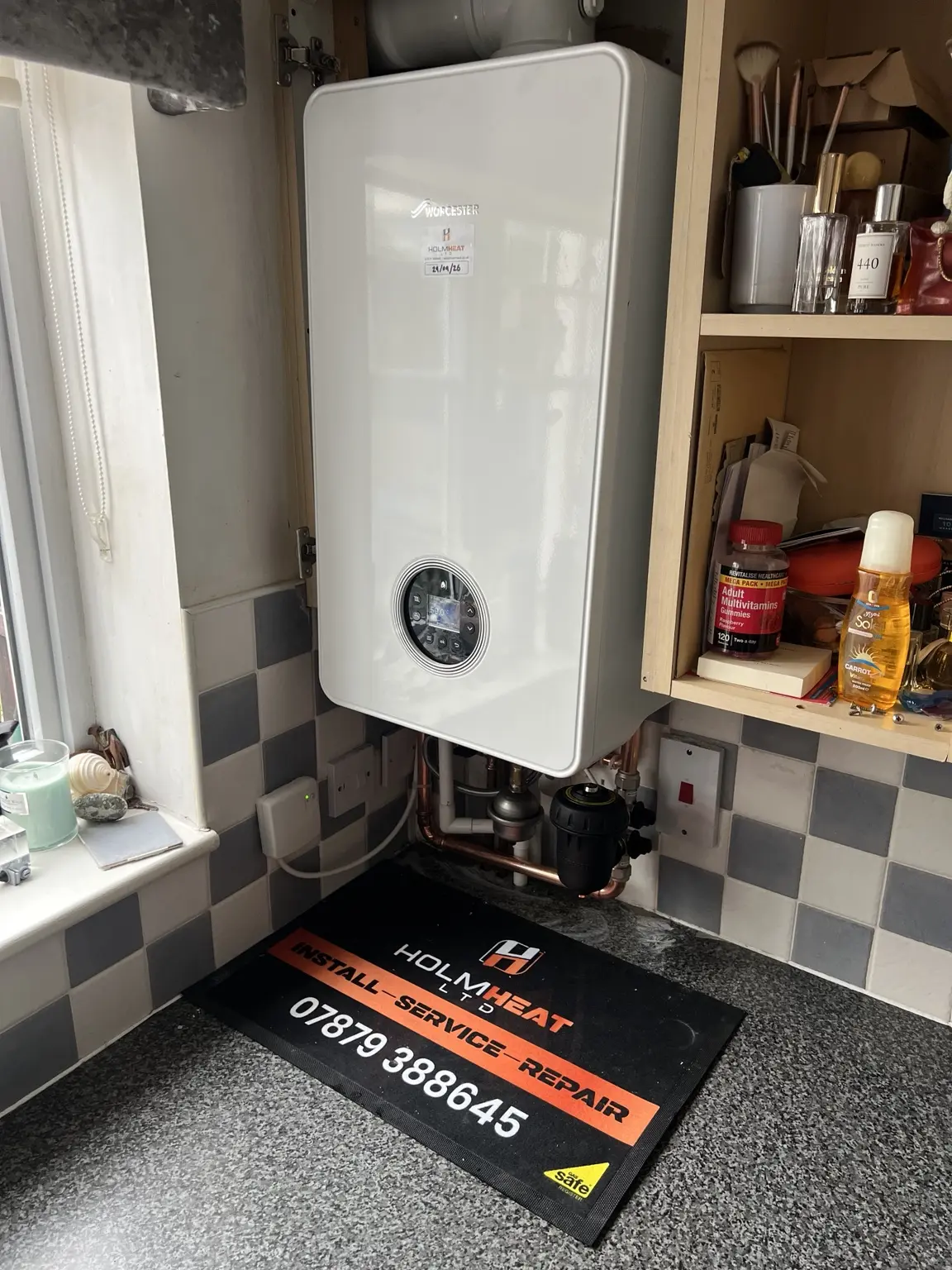 Combi boiler neatly installed in a kitchen