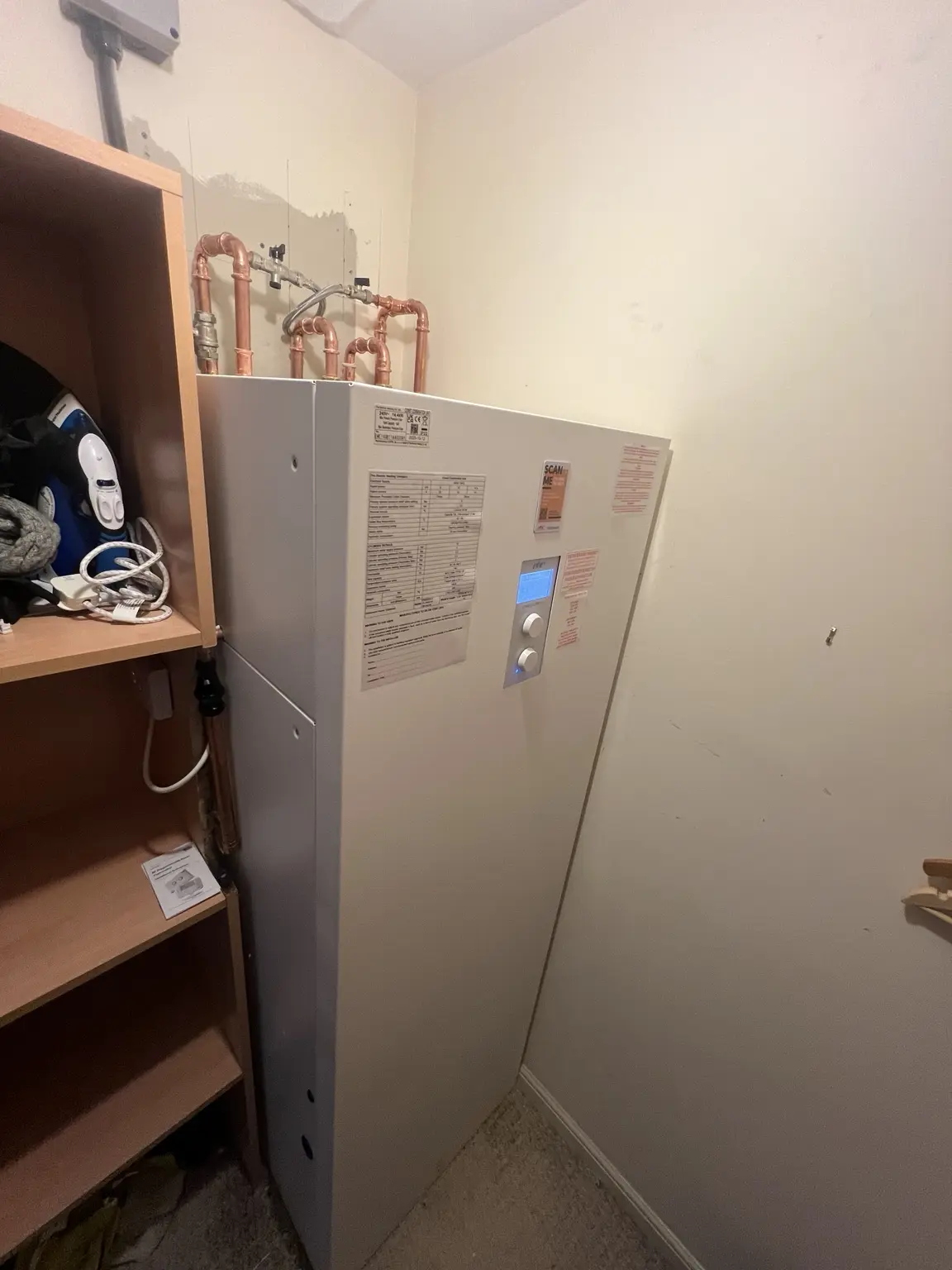 Electric boiler and stored hot-water installation